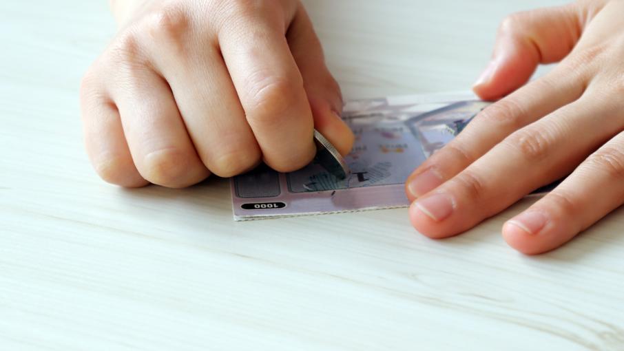 pièce ticket à gratter